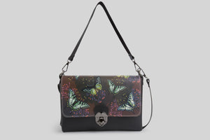 woman-butterflies-shoulder-bag