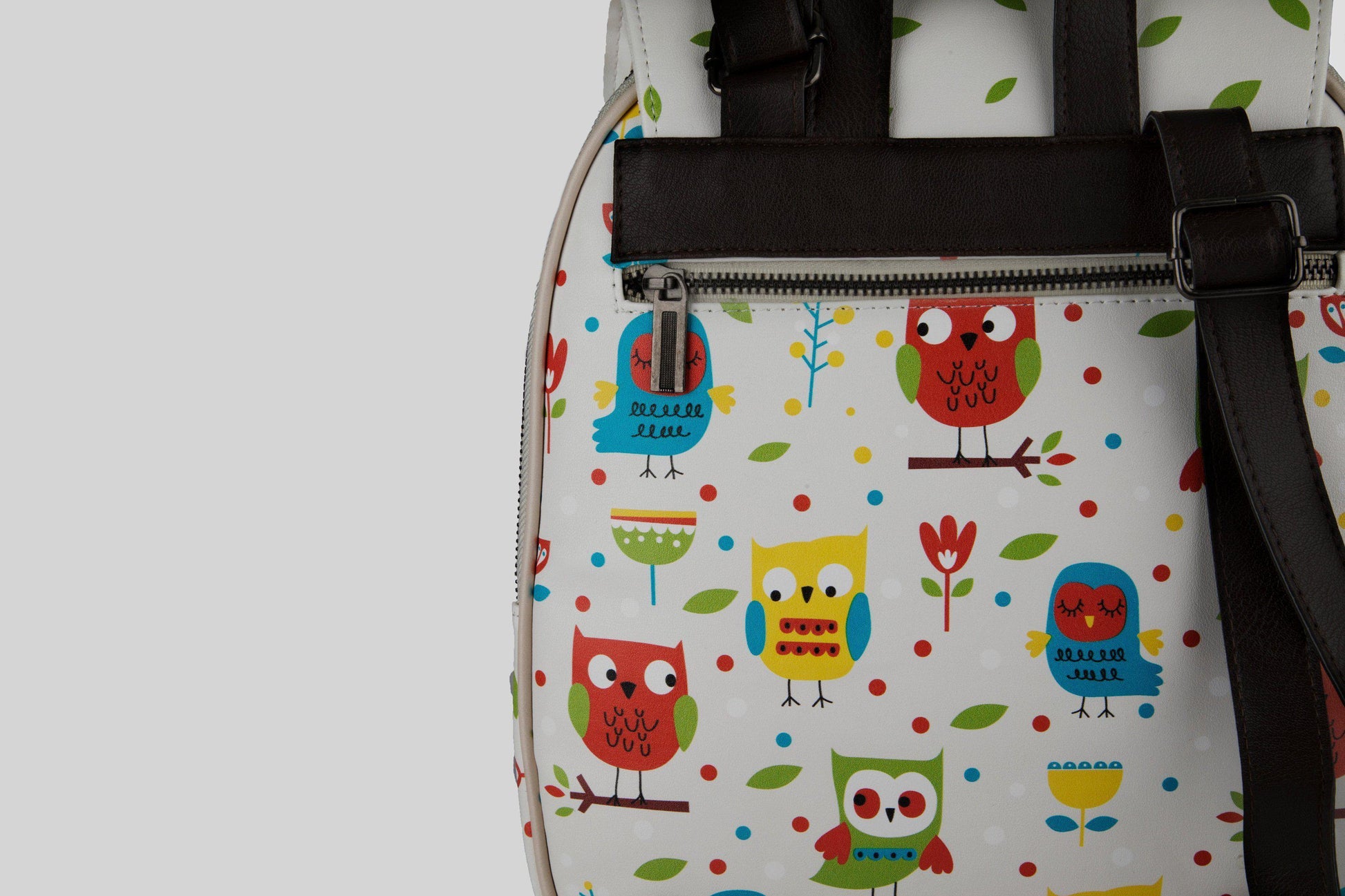 woman-colorful-owls-beige-backpack