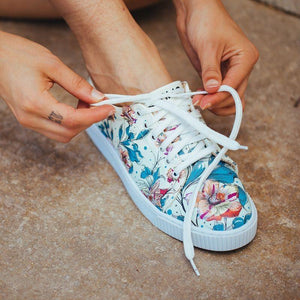 woman-flowers-on-green-sneakers