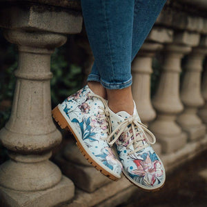 woman-flowers-on-green-short-boots