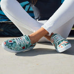 woman-ladybugs-and-flowers-sneakers